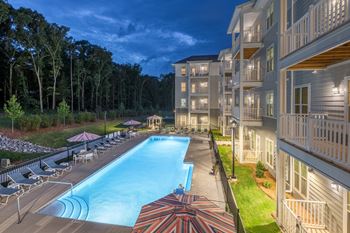 Outdoor saltwater pool with poolside lounging
